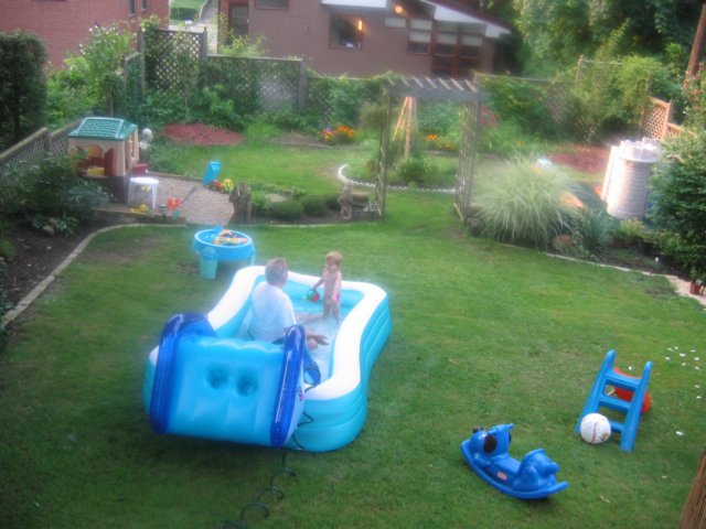 playinginourbackyardpool.jpg